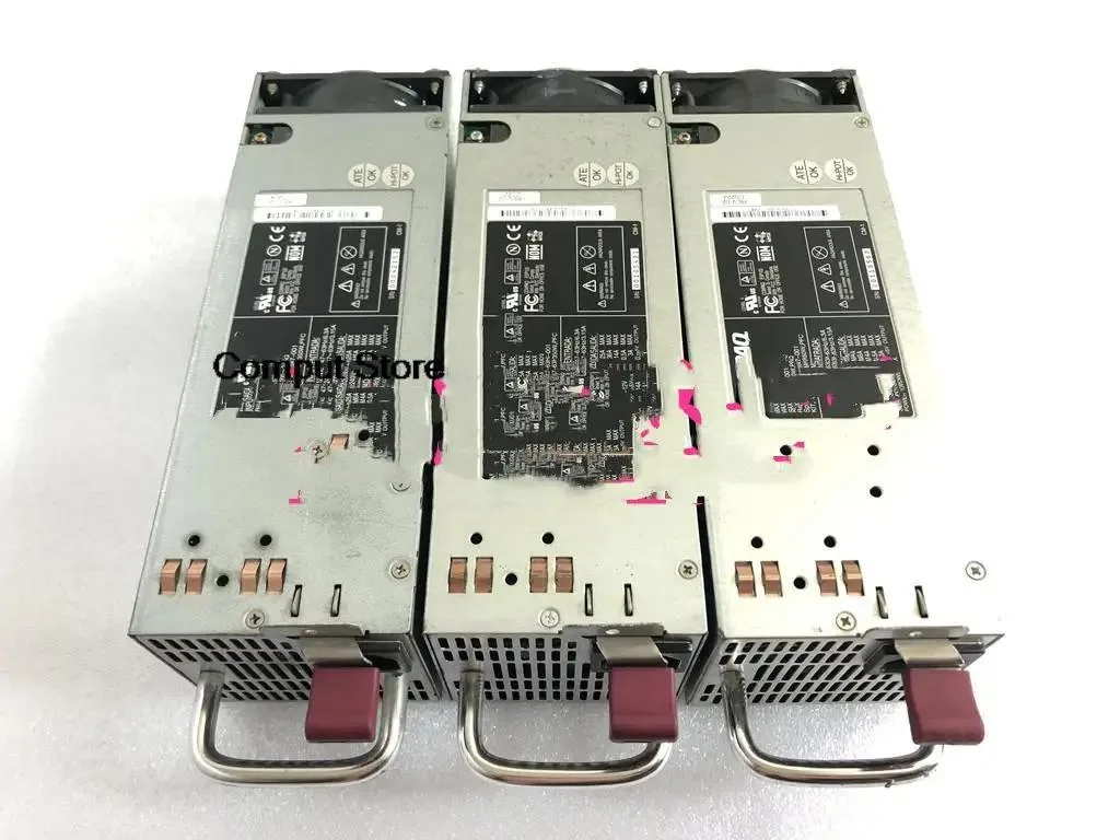 Rectangular silver server power supply unit with rear fan grille and power socket