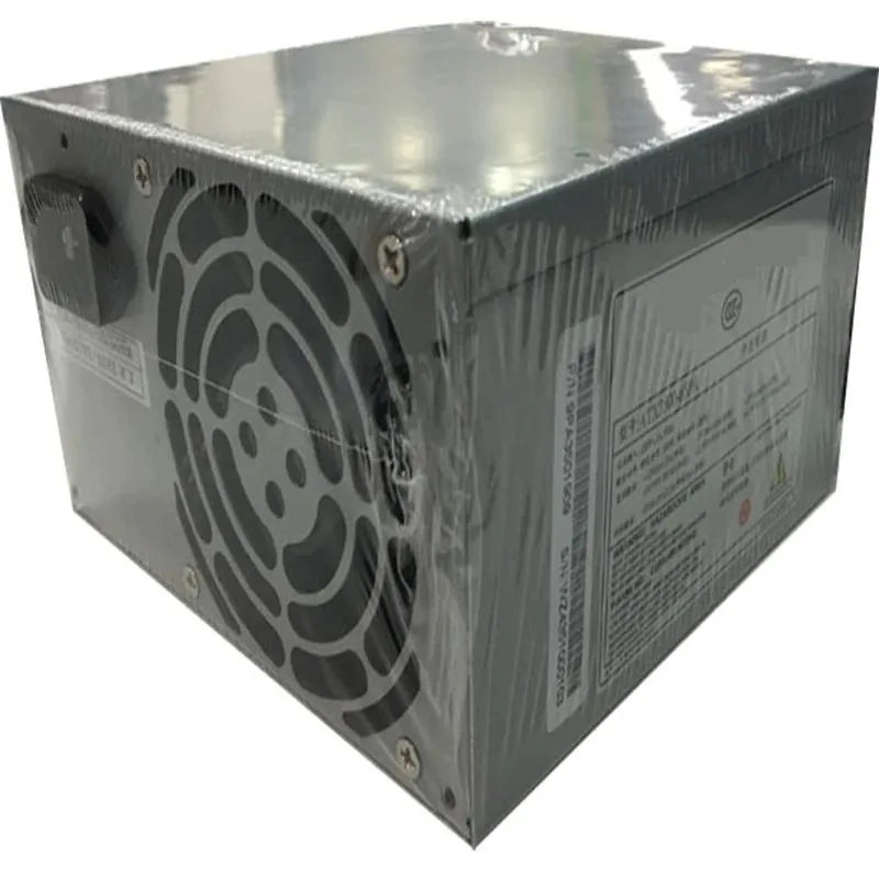 Rectangular black metal ATX power supply with fan grille and cable bundle