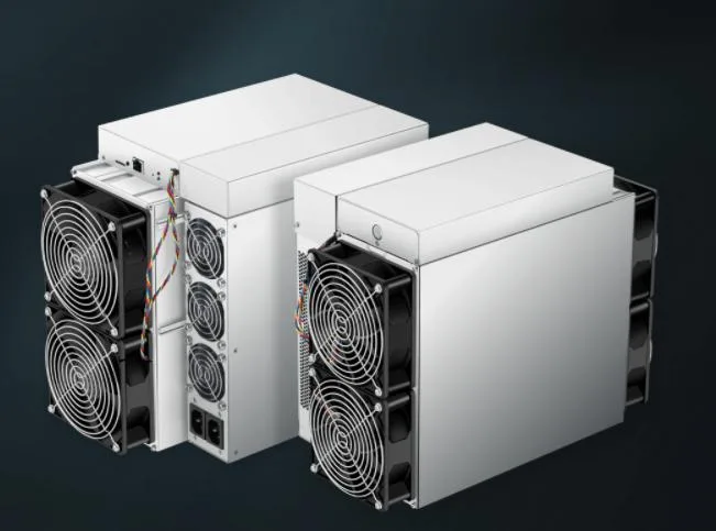 Rectangular silver metal mining unit with front grille and rear power supply visible