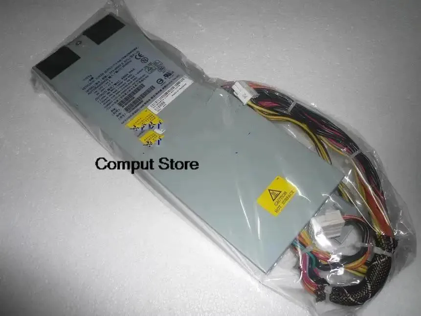 Rectangular silver server PSU unit with rear grille and label