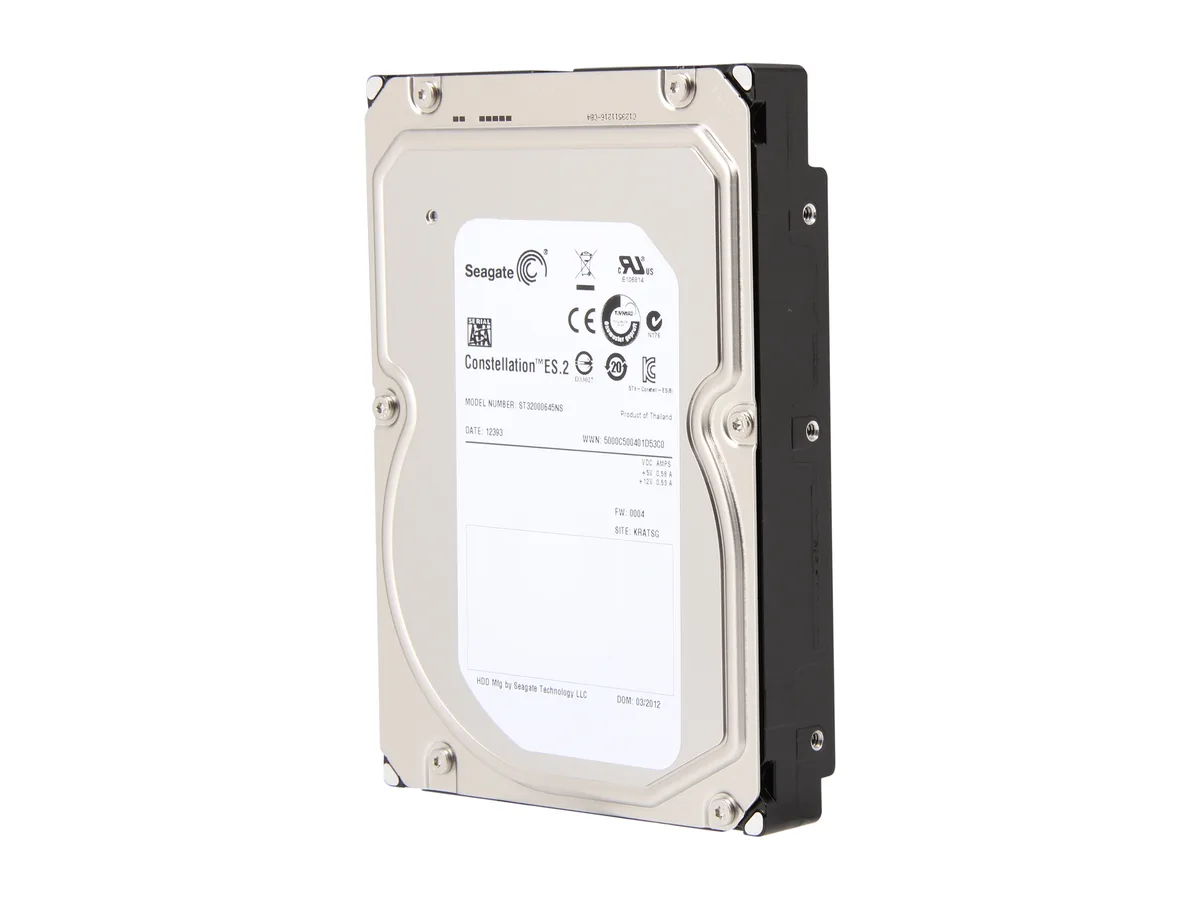 Silver 3.5 inch bare hard drive with exposed circuit board and SATA connectors