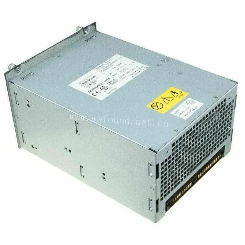 Rectangular metal ATX power supply unit with ventilation grille and label showing model numbers