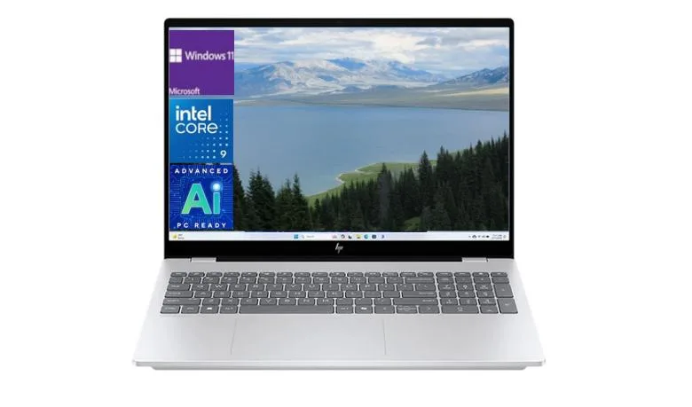 Silver 16 inch laptop with edge-to-edge glass OLED touchscreen and backlit keyboard