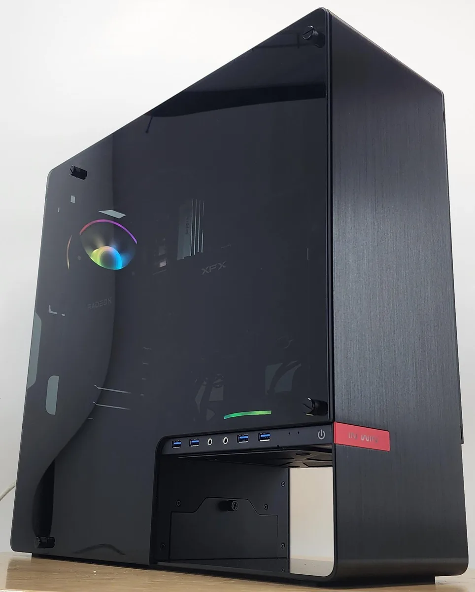 Silver INWIN 904 ATX mid-tower showing front mesh panel and RGB-lit interior