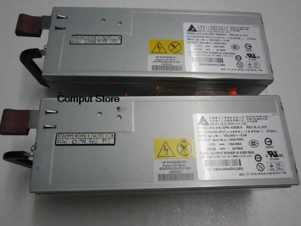 New ATX server power supply unit, silver metal casing, rear fan grille, power socket and label visible