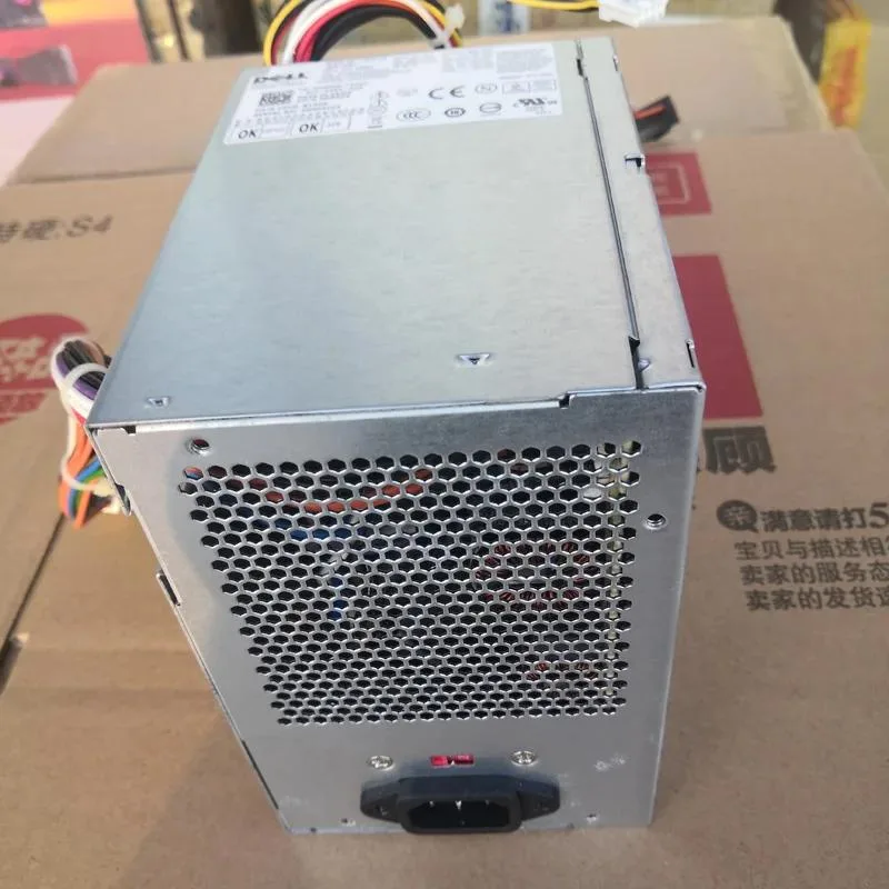 Rectangular ATX power supply with gold label and fan grille