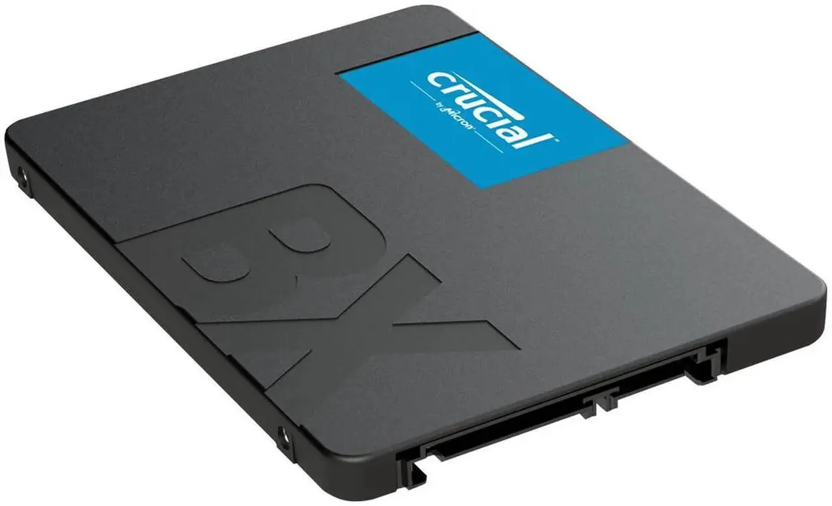 A black 2.5 inch SATA SSD with a silver label on top