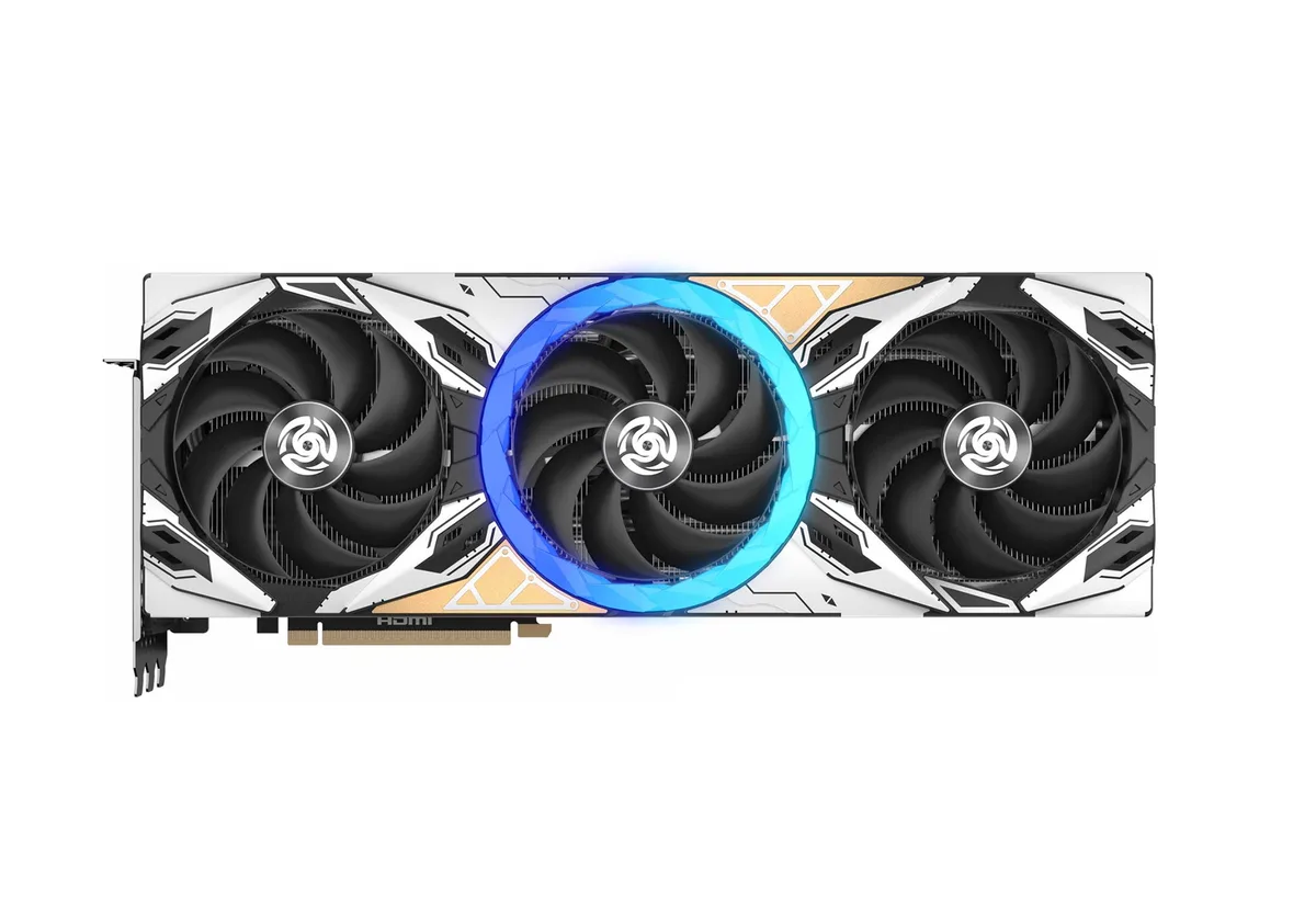 White triple-fan graphics card with silver accents and exposed vapor chamber visible through the cooler