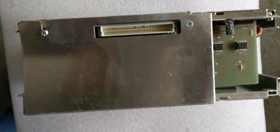 Rectangular ATX power supply unit in matte black finish with cooling fan grille
