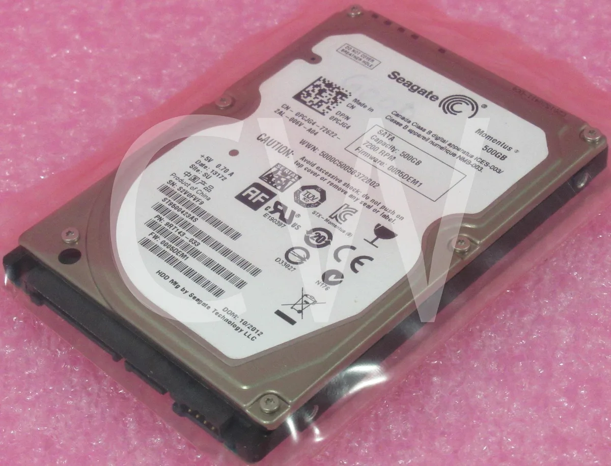 Silver 2.5 inch SATA hard drive with label showing model ST9500423AS
