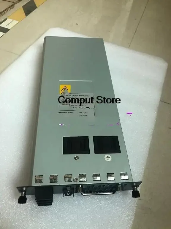 Rectangular silver metal power supply unit with label reading 650W DC PSR650-D