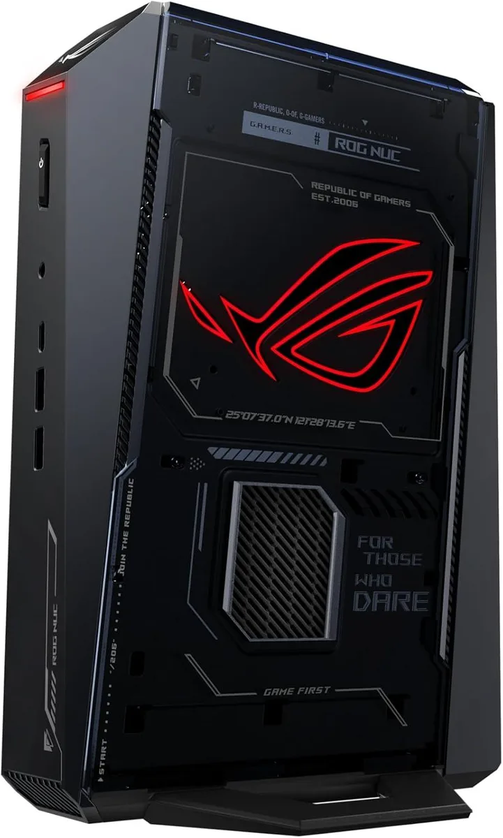 Compact black mini PC with three visible cooling fans and subtle RGB lighting accents