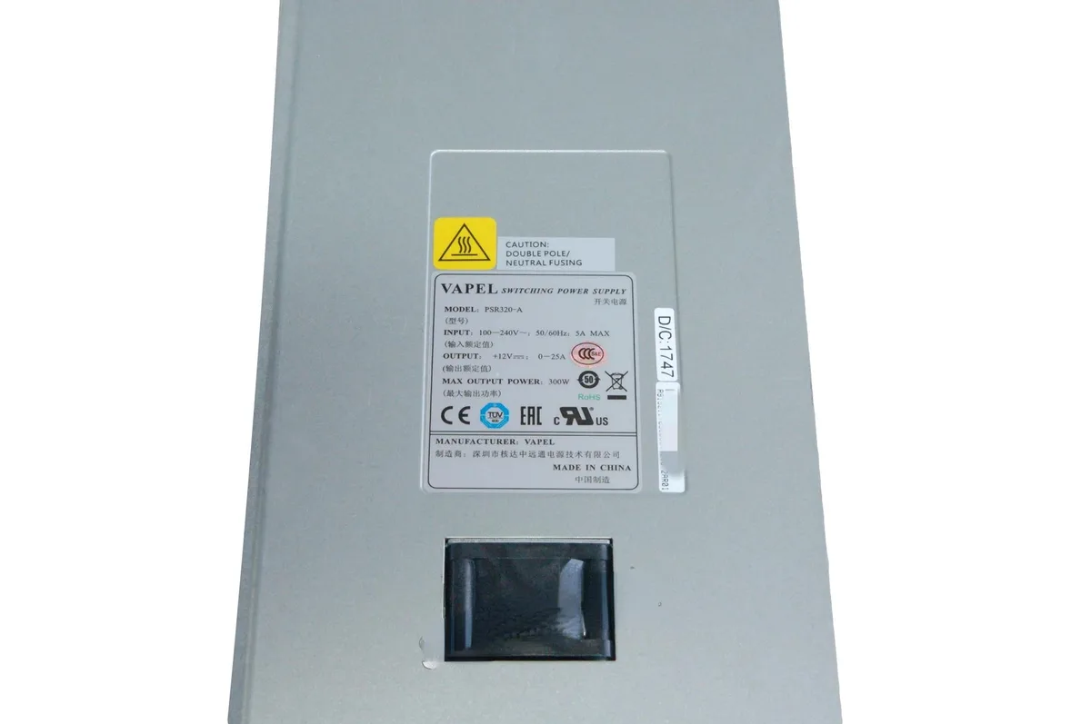 Rectangular ATX power supply unit with ventilation grille and model label