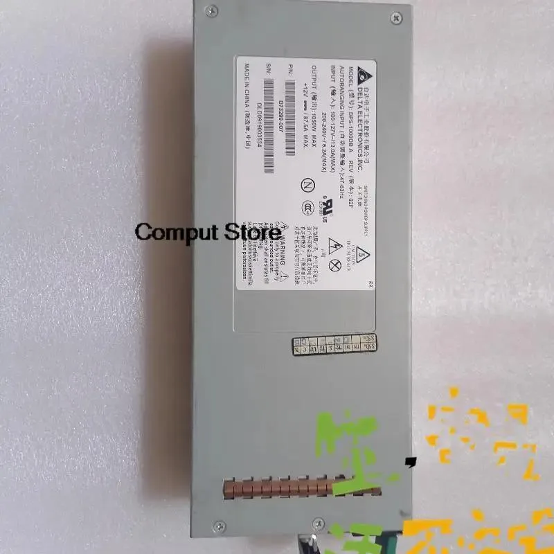 Rectangular silver server power supply unit with label showing model DPS-1000DB A D73299-007 1050W
