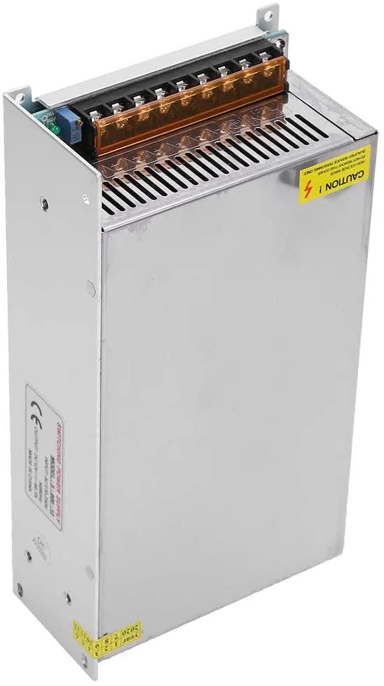 Pink rectangular aluminum power supply unit with terminal connections and adjustment knob