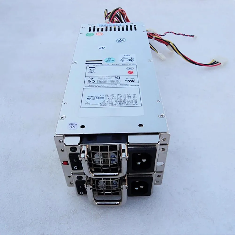 Rectangular silver server PSU with fan grille and power socket
