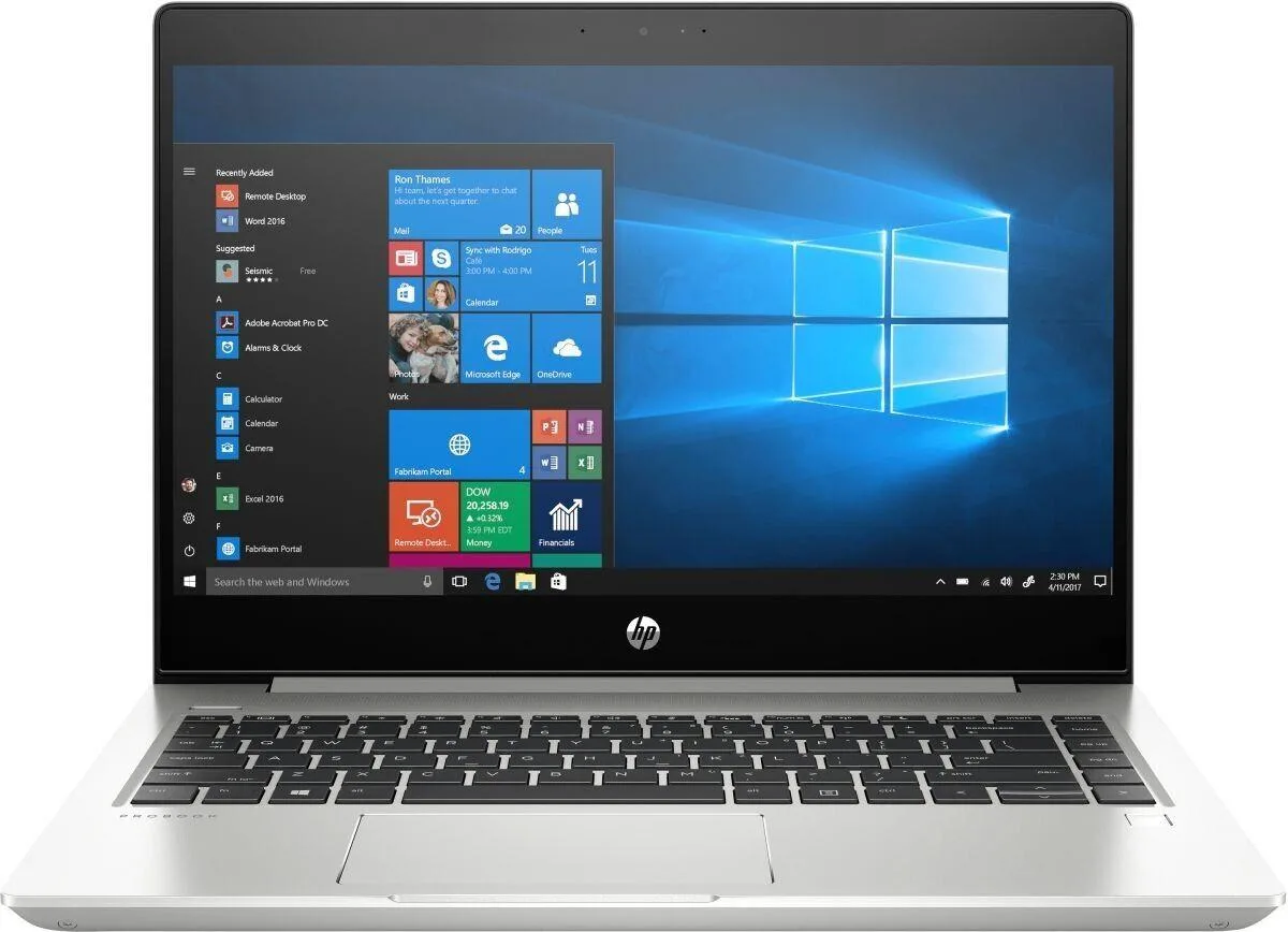 Silver HP ProBook 445R G6 14 inch laptop with visible scratches on lid and bottom