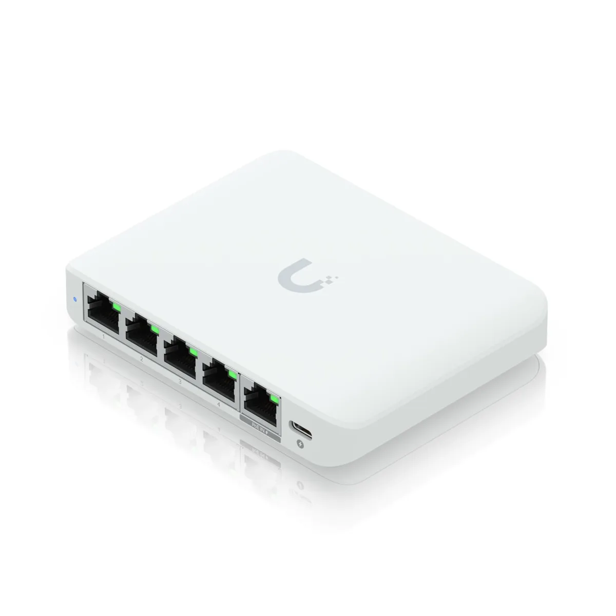 Small white desktop switch with five RJ45 ports and a USB-C power socket