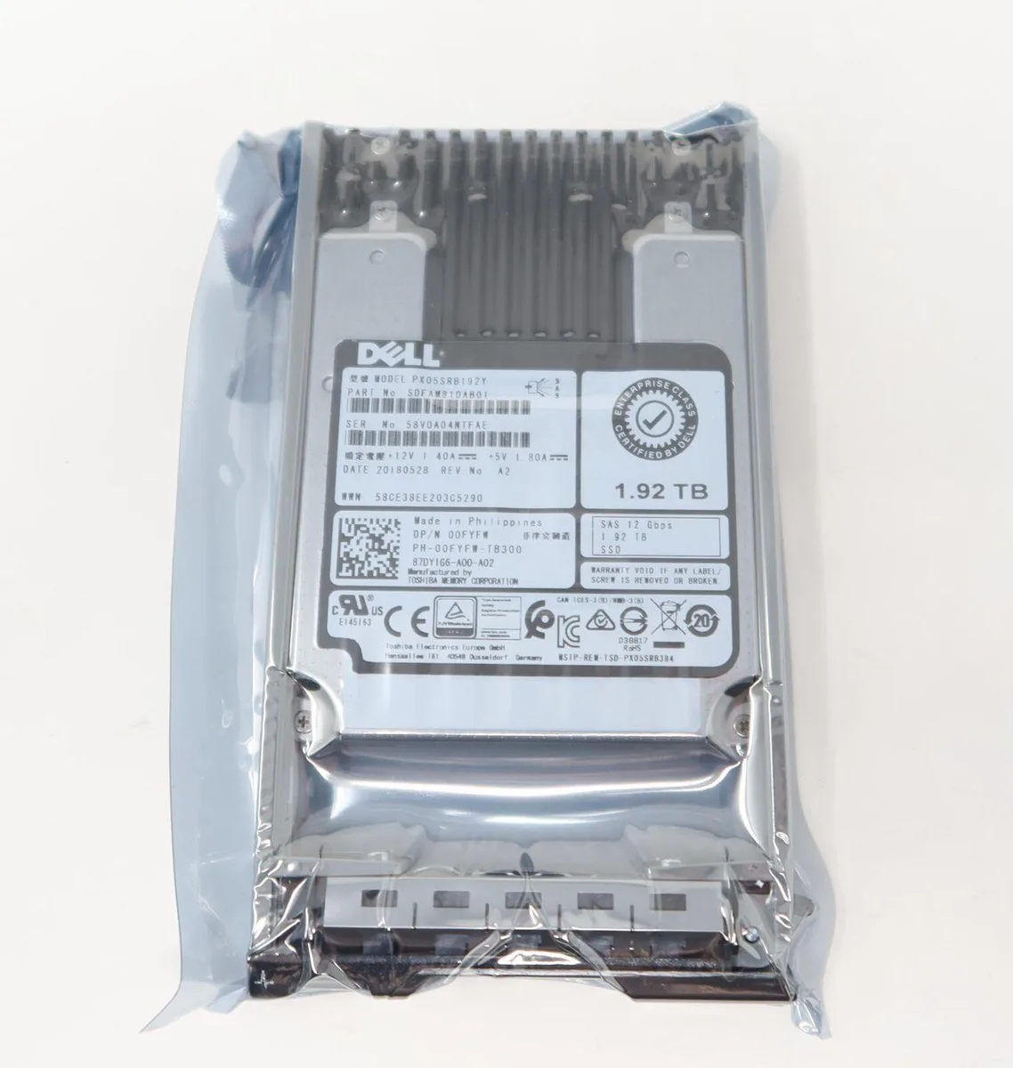Silver 2.5 inch SAS SSD with Dell label and caddy tray