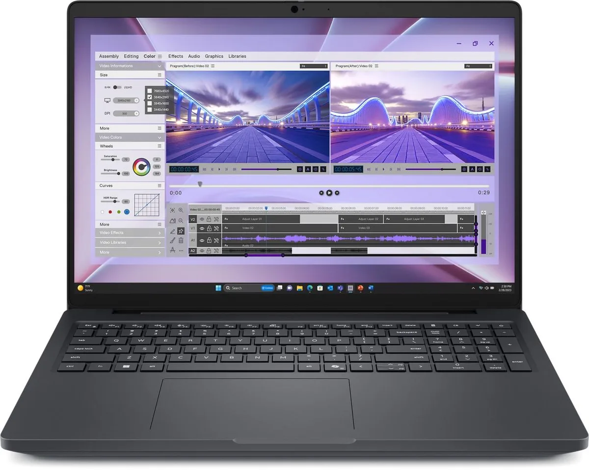 Black 16-inch laptop with numeric keypad and webcam