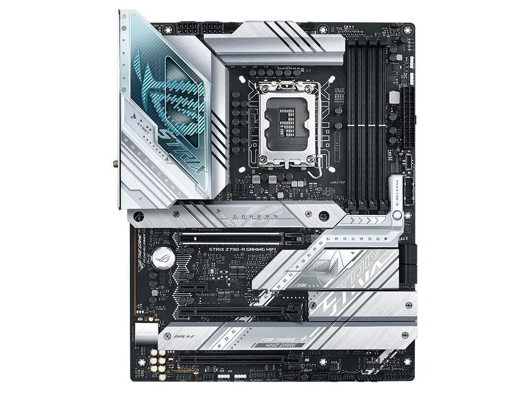 ATX motherboard with silver heatsinks and black PCB