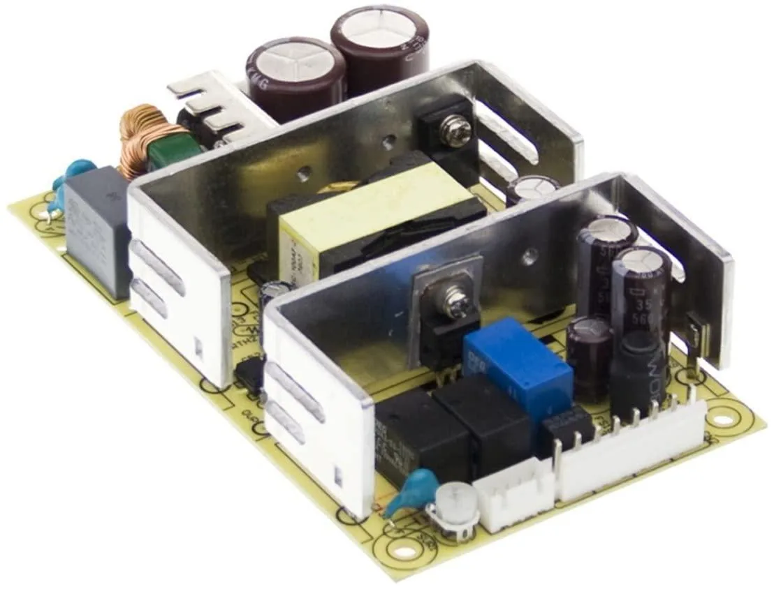Bare PCB dual-output power supply, green board with soldered components and terminal blocks
