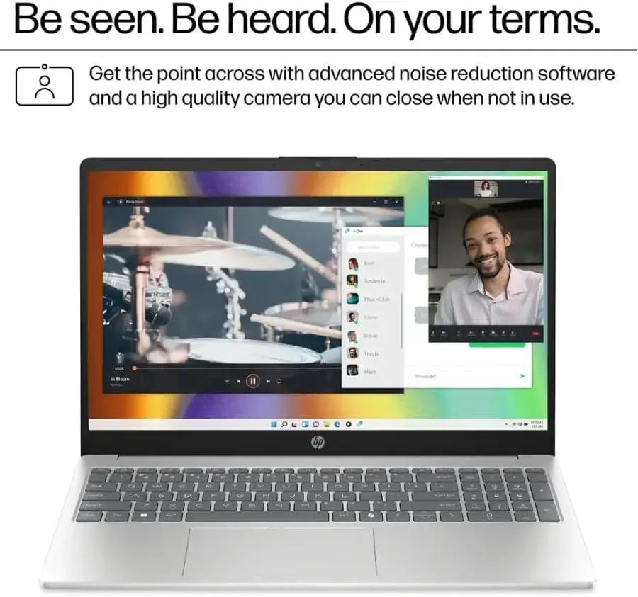 Silver HP 15.6 inch touchscreen laptop open showing keyboard and screen
