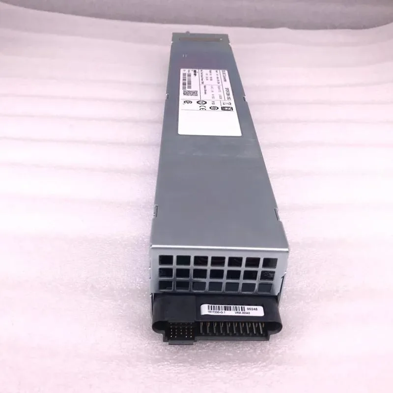Rectangular metal power supply unit with fan grille and label