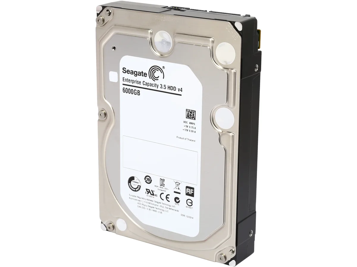 3.5 inch silver bare hard drive with circuit board visible