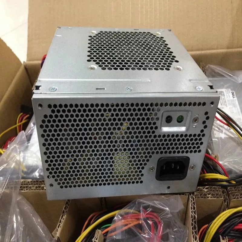 Rectangular silver ATX power supply unit with fan grille and cable bundle