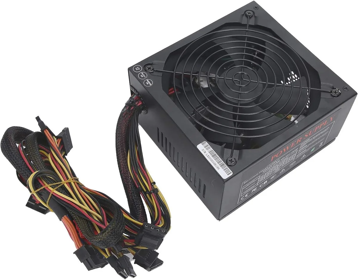 Black ATX power supply unit with 14cm fan and visible cable connectors