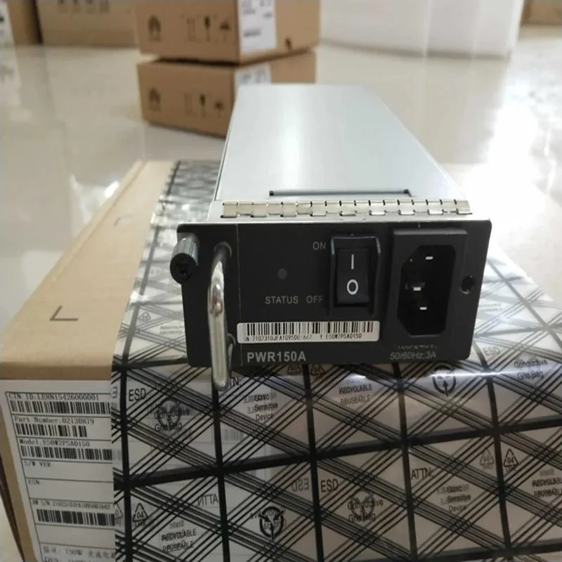 Rectangular metal ATX power supply unit with ventilation grille and power connectors