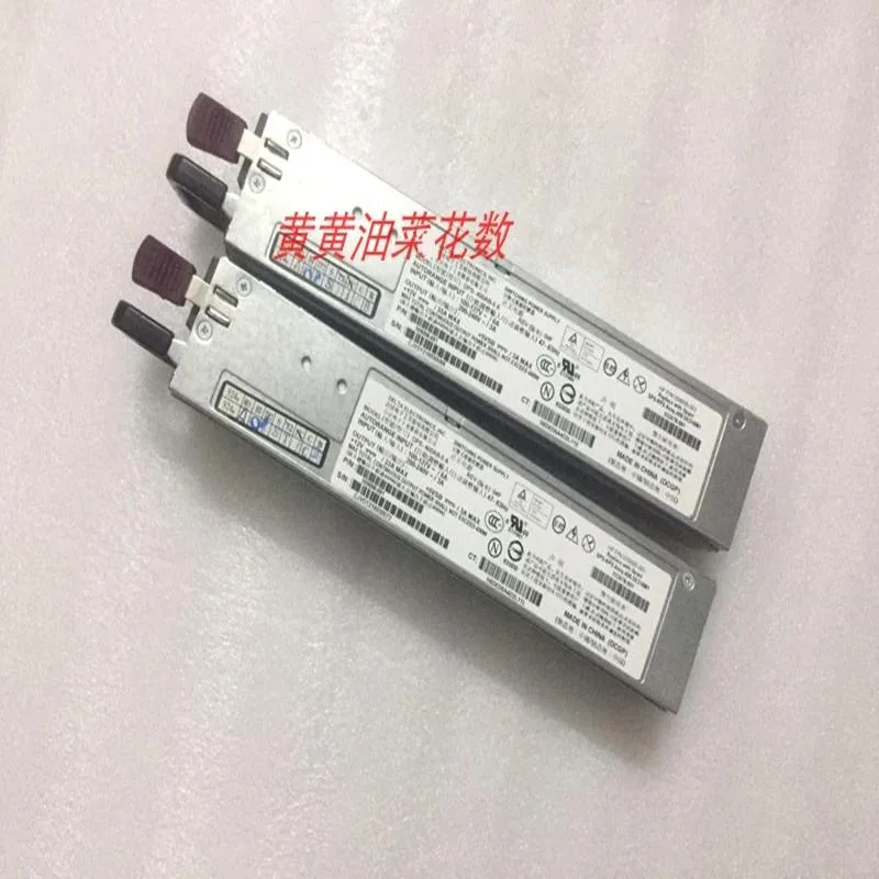 Rectangular metal ATX power supply unit with ventilation grille and label