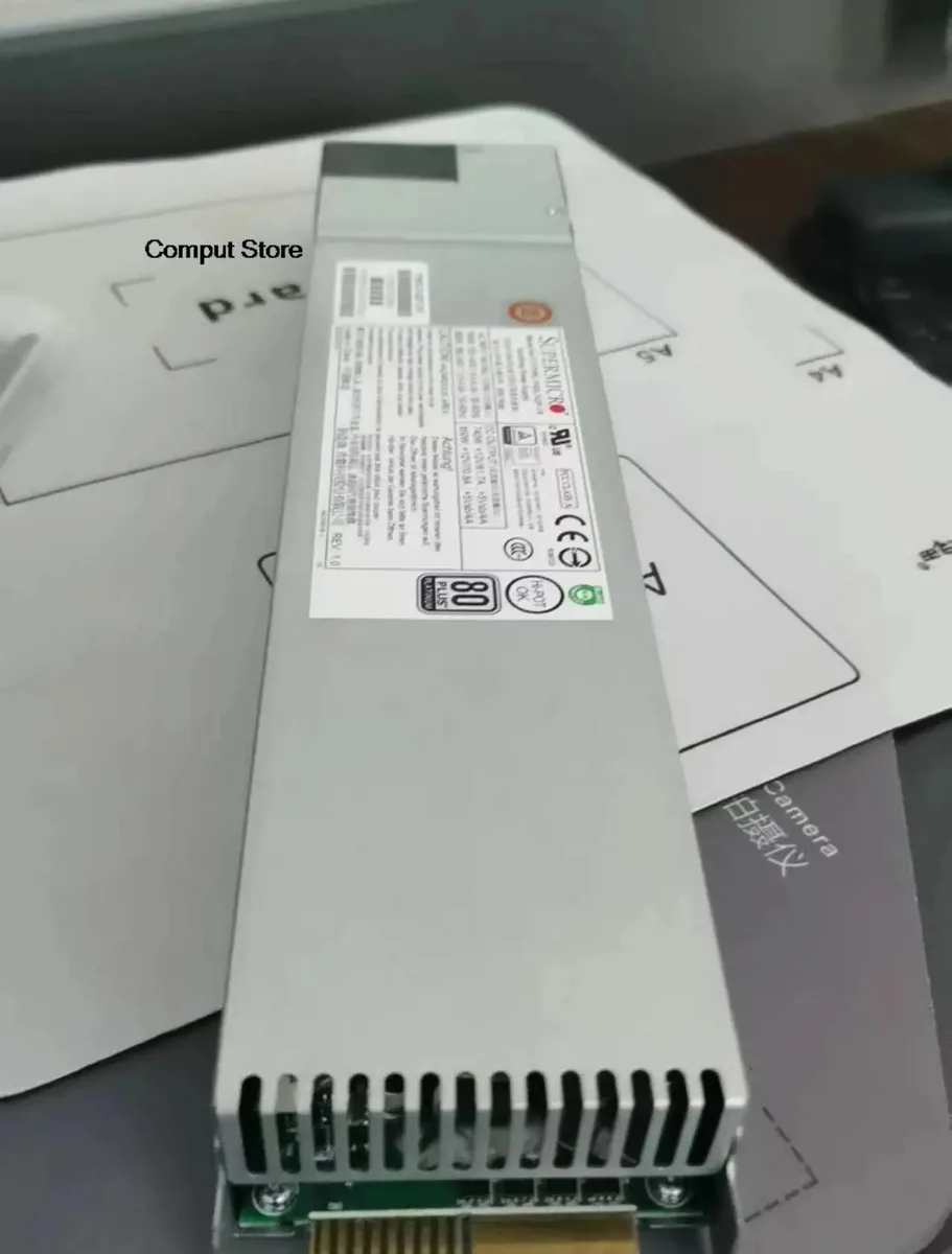 Silver ATX power supply module labelled RMX508 1500 1800 2000 PWS-742P-1R