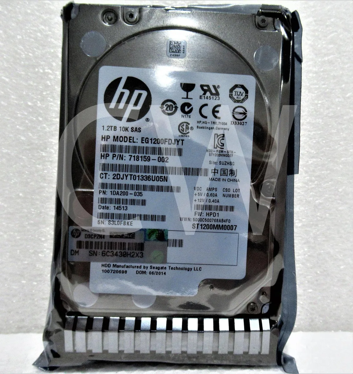 Silver 2.5 inch SAS hard drive in a black carrier tray with green release lever