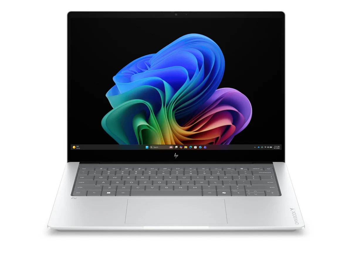 Silver 14-inch OLED touchscreen laptop with edge-to-edge glass