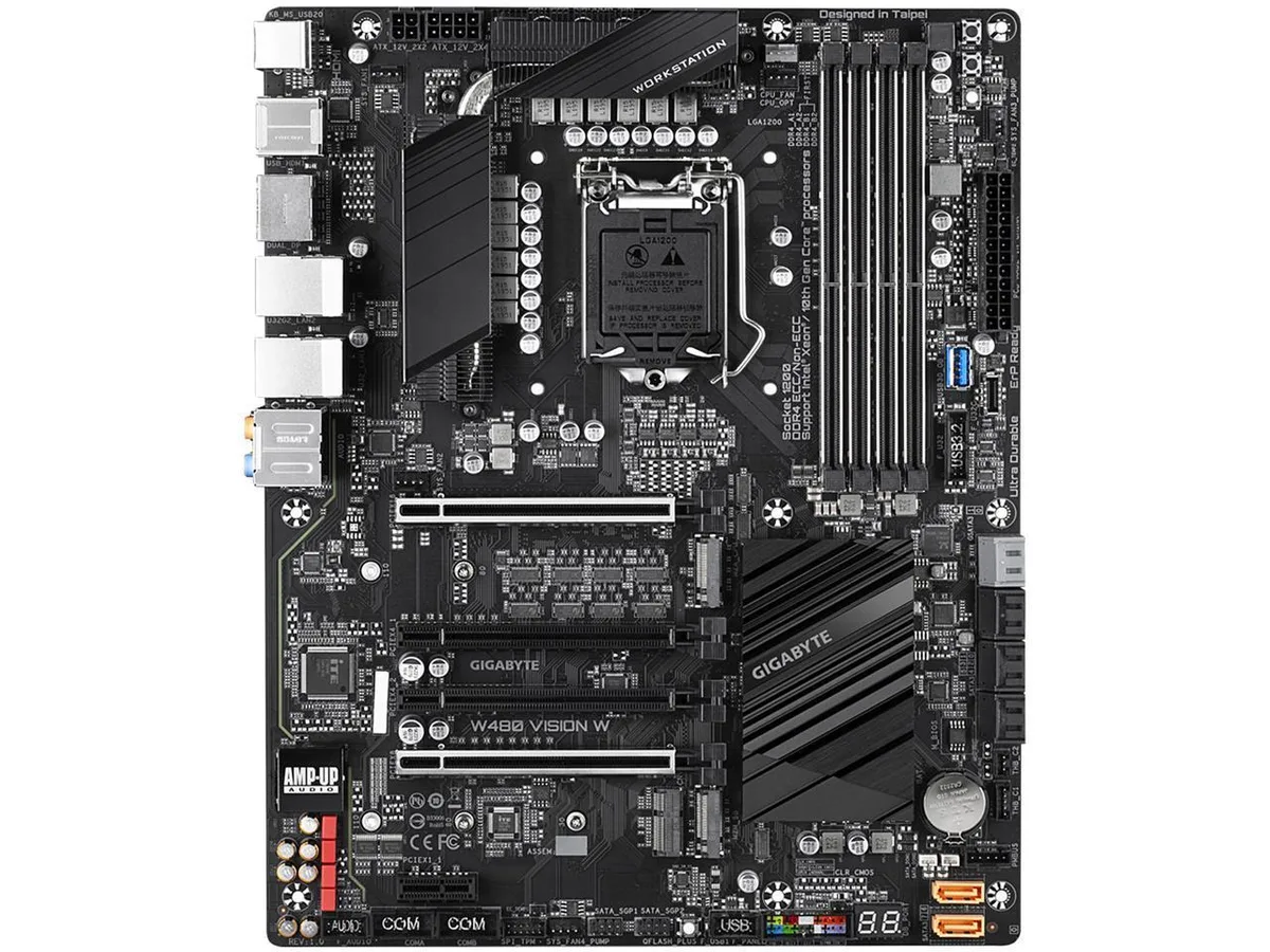 Green ATX motherboard with silver heatsinks and black slots