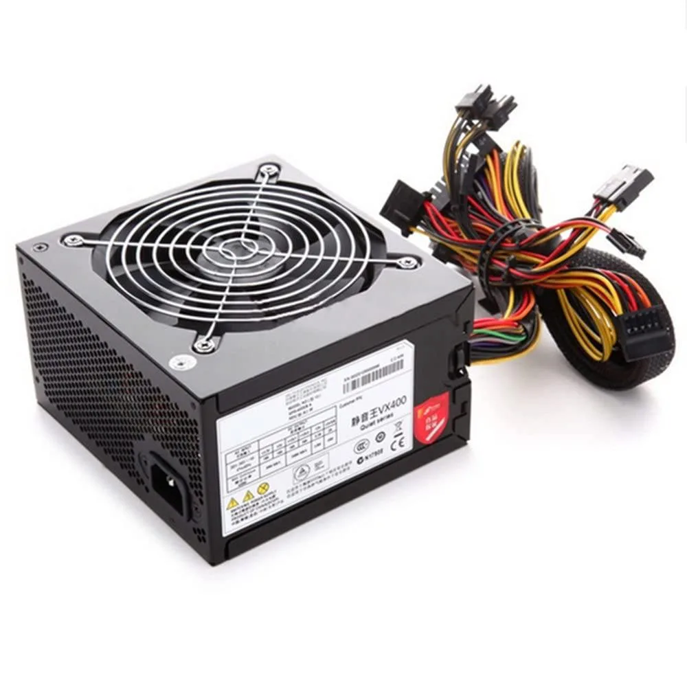 Rectangular metal power supply unit with ventilation grille and rear connector panel