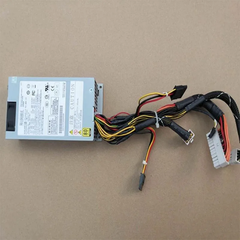Silver 1U ATX power supply unit with rear fan grille and cable connectors