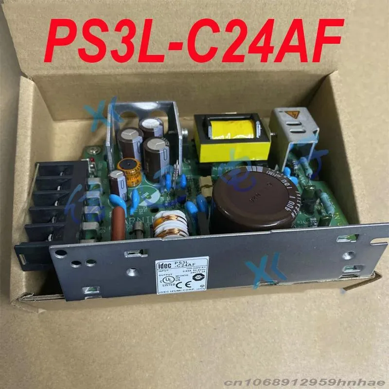 Rectangular silver metal power supply unit with label and terminals
