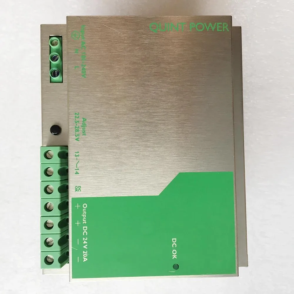 Silver ATX power supply unit with label showing 100-240AC 24DC 20
