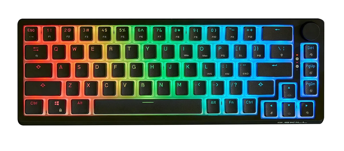 Compact black 65% mechanical keyboard with pudding keycaps and volume knob