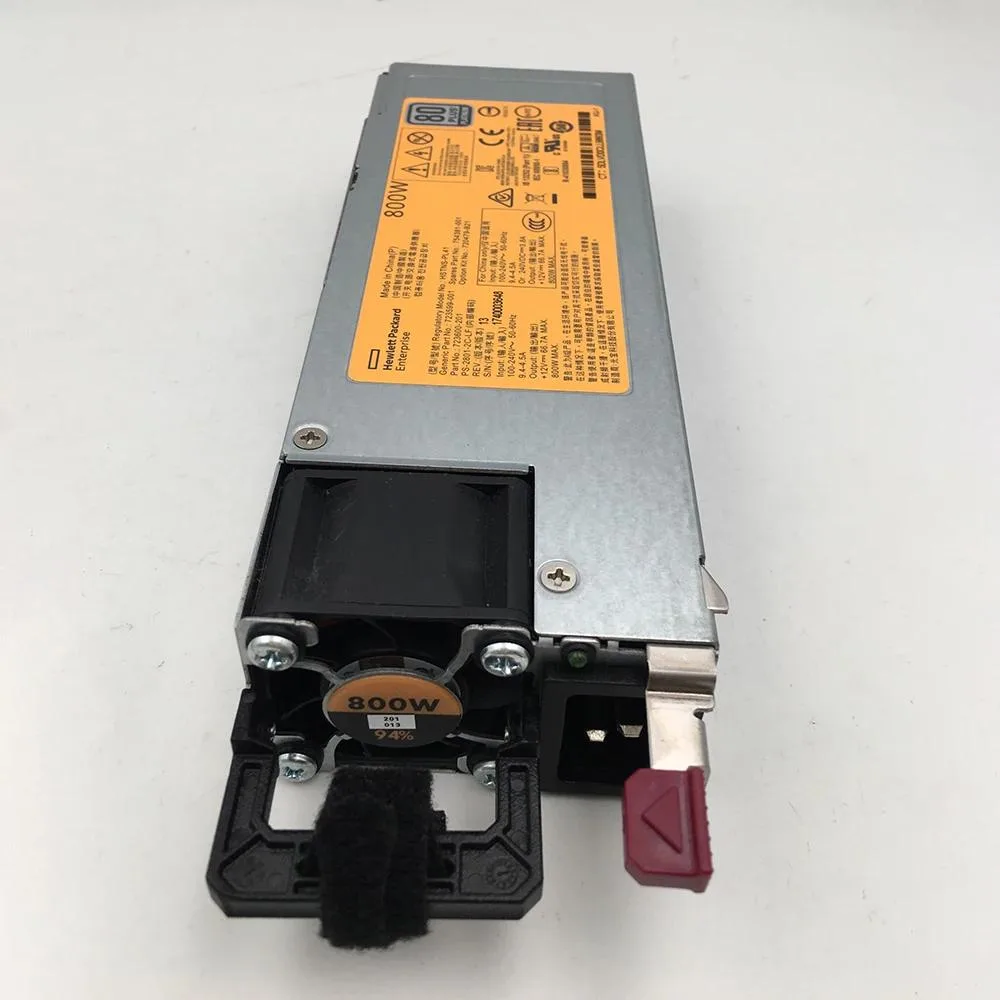 Silver rectangular ATX power supply unit with ventilation grille and label showing model numbers