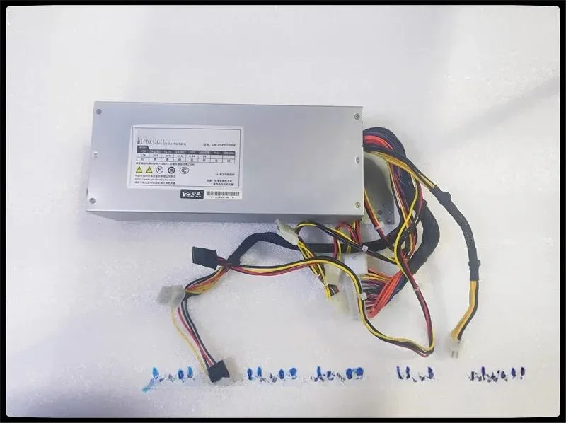 Silver 2U server power supply unit with rear fan grille and cable connectors