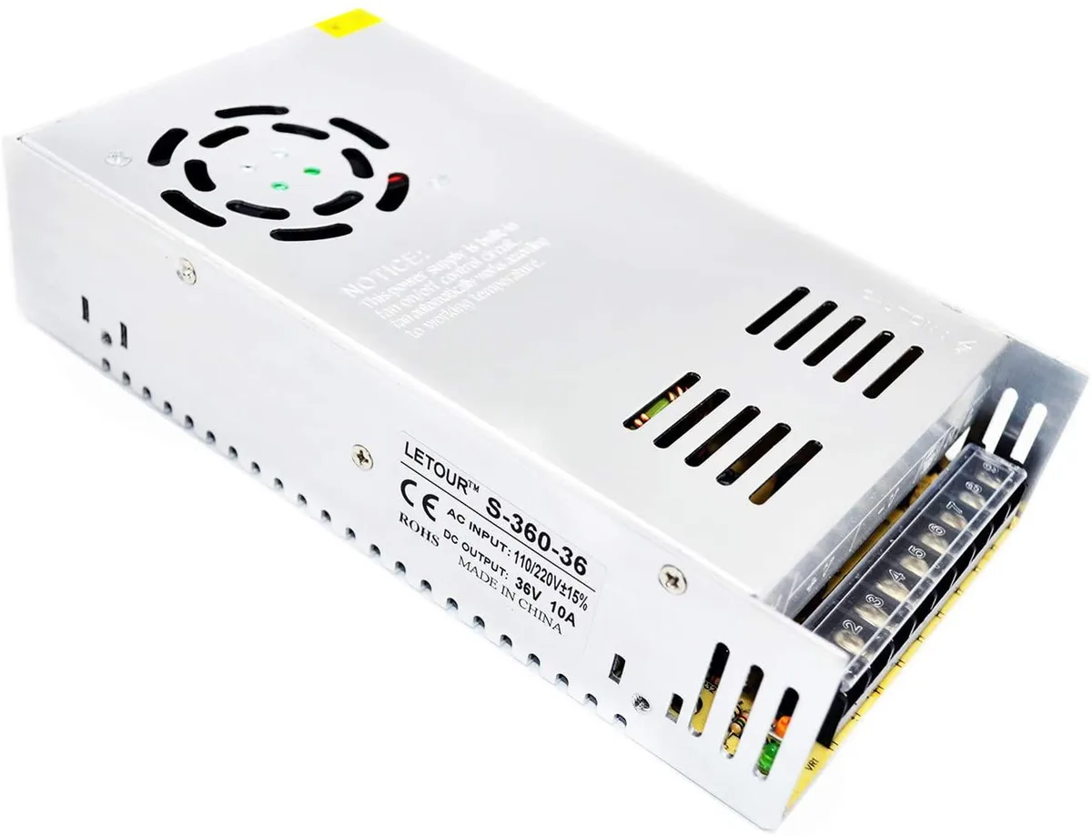 Silver rectangular metal power supply with terminal screws and voltage adjustment knob
