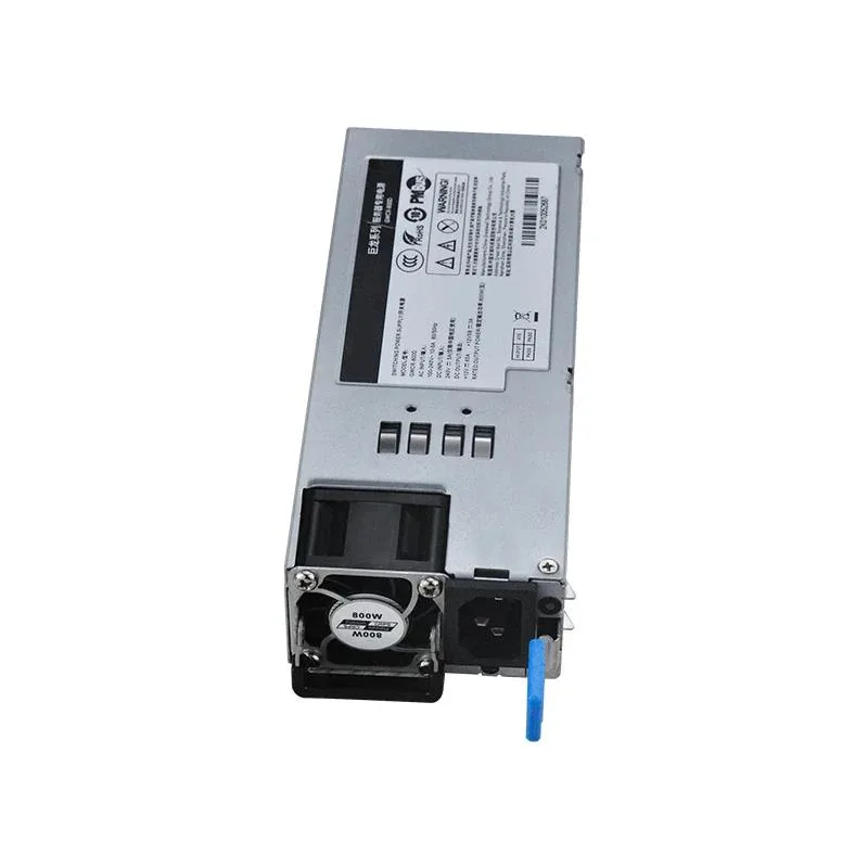 Rectangular metal ATX power supply unit with matte black finish and cooling fan visible