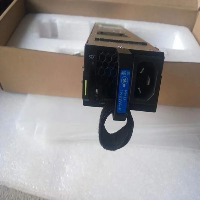 Rectangular ATX power supply unit with matte black finish and cooling fan visible