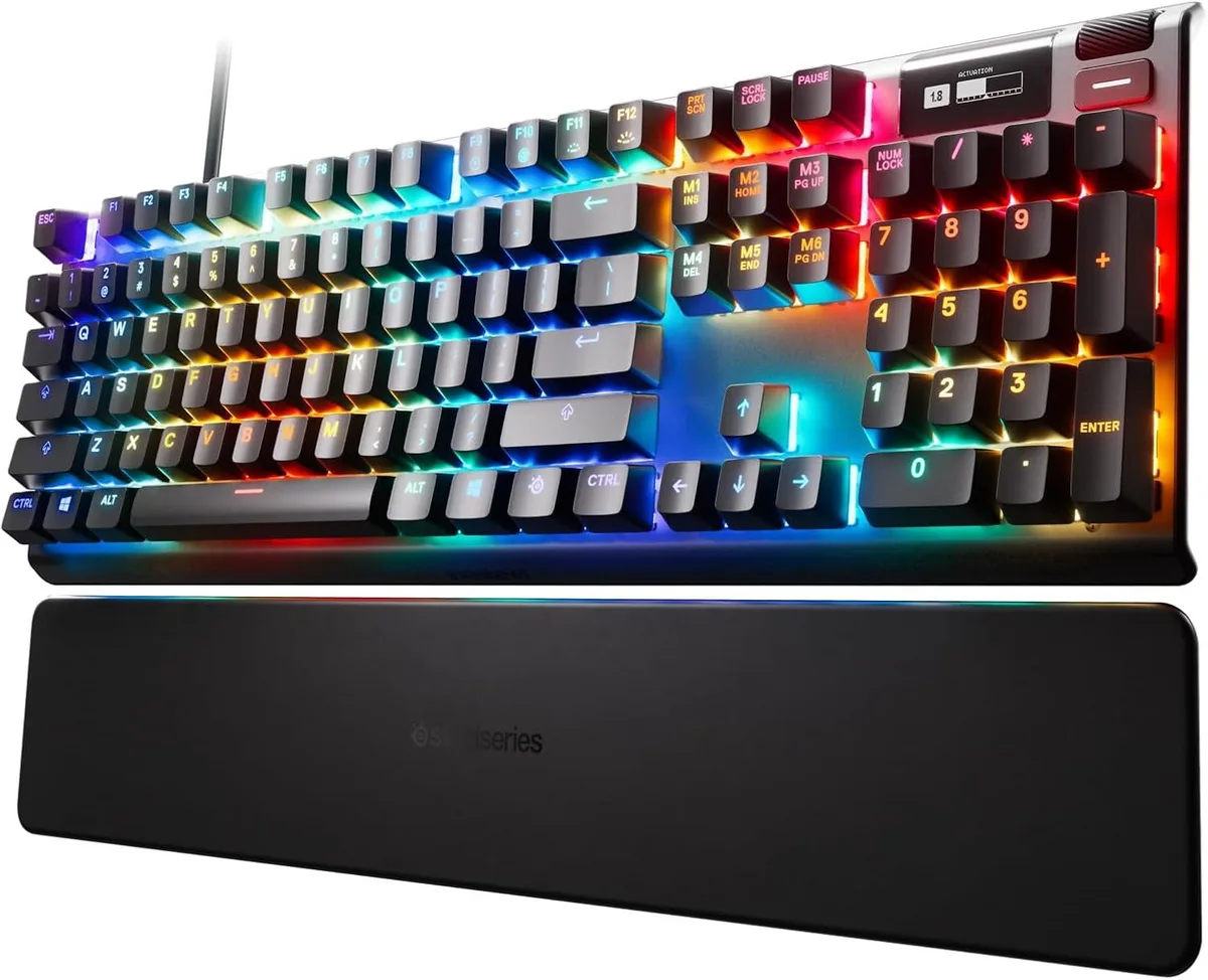 Full-size black gaming keyboard with aluminium frame, OLED display and detachable wrist rest