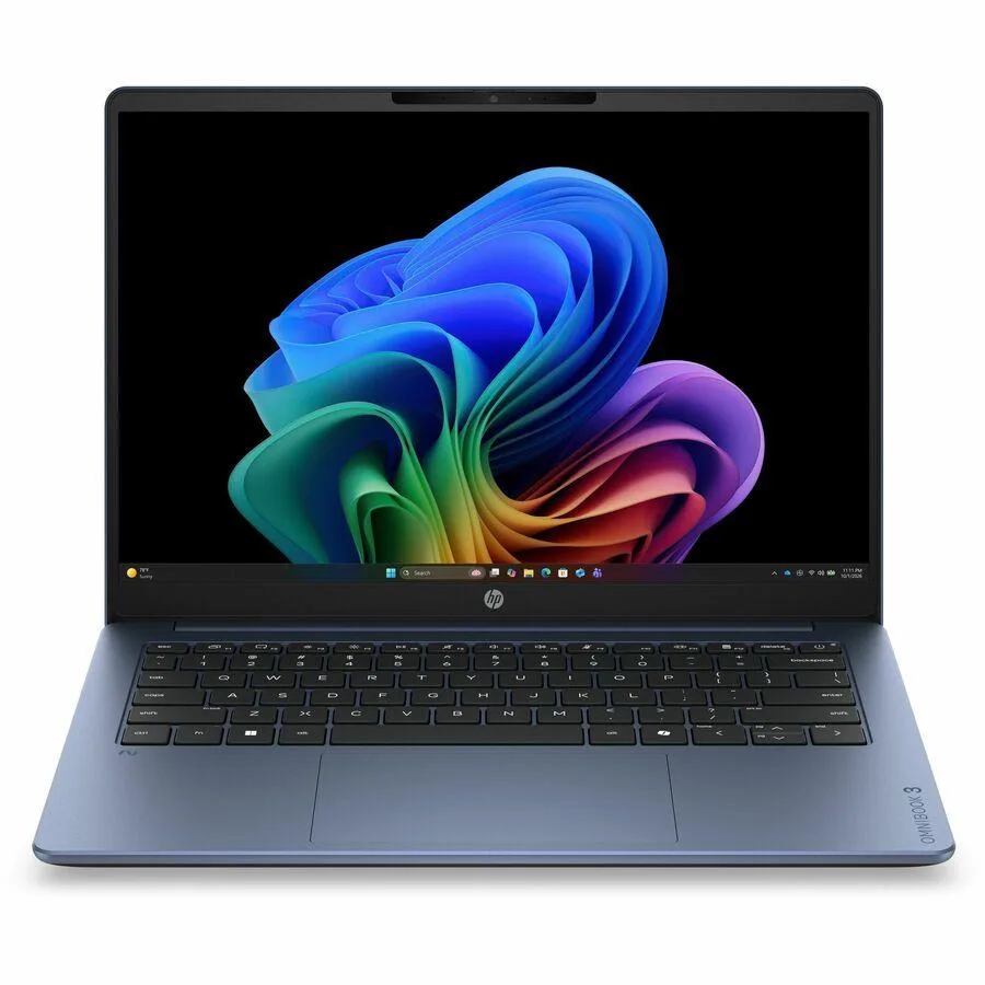 Silver 14 inch laptop with touchscreen display closed on flat surface