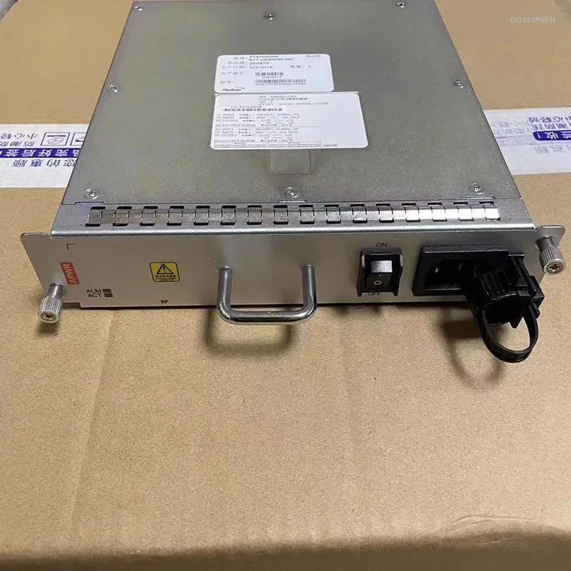 Rectangular black ATX power supply unit with gold certification badge visible